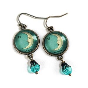 The Divine Iguana La Luna Earrings, Moon Face with Teal Accents, NWT 🌙